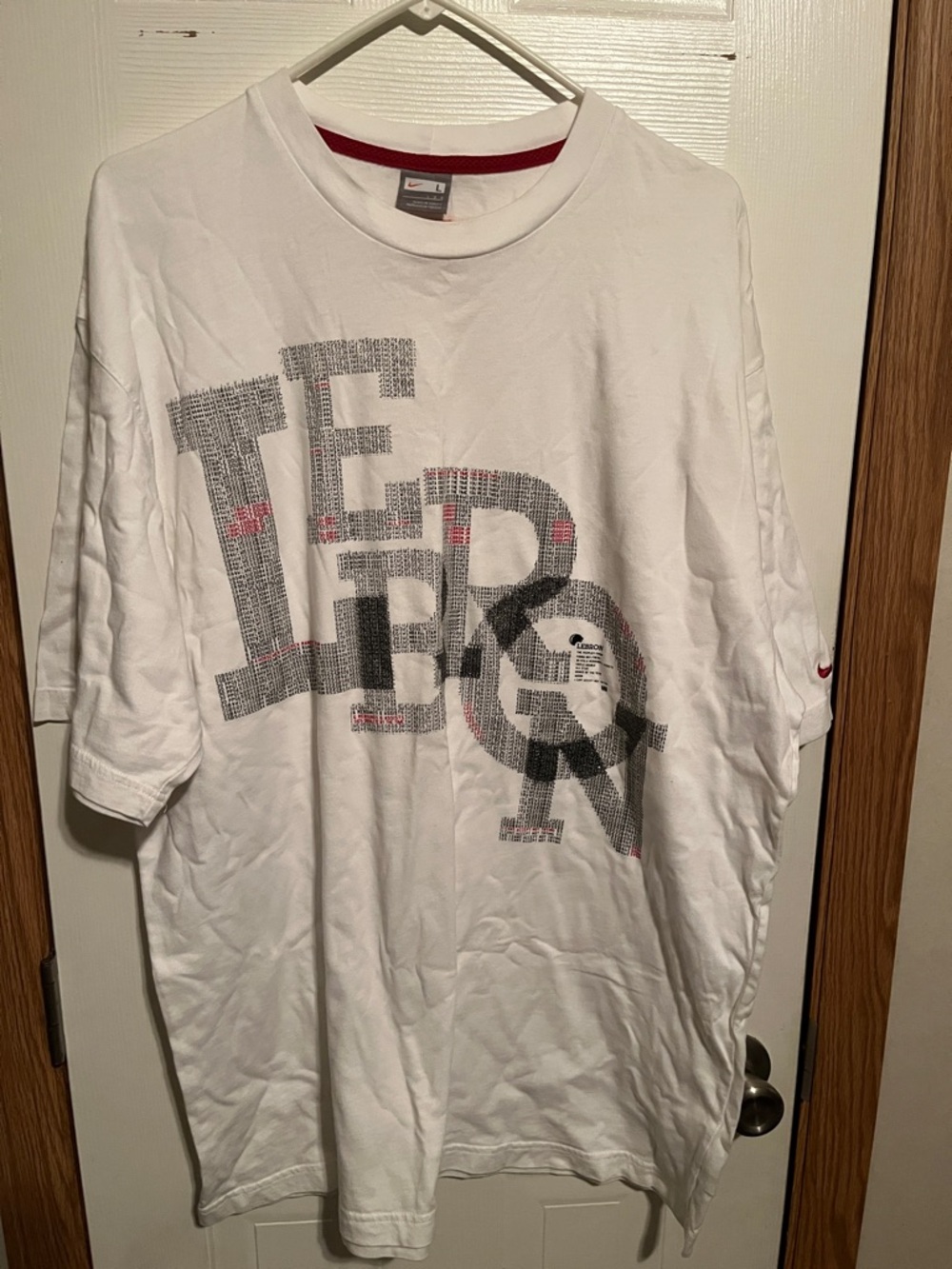 White Short Sleeve Graphic Tee with Red Accents by Nike